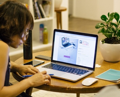 woman browsing on her laptop